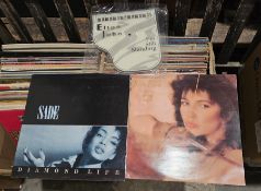 Box of vinyl LP albums mostly pop including The Doors, Weird Scenes Inside, the Gold Mine (