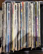 Two boxes (approximately 130) vinyl LP albums mainly rock and pop with some compilations,