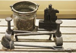 Interesting copper hanging pan, pair of cast iron fire dogs, door stop and two fire tools