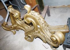 Pair of large 19th century gilt metal scrolling foliate andirons