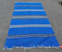 Tunisian blue rug with black and white stripes, 208cm x 150cm