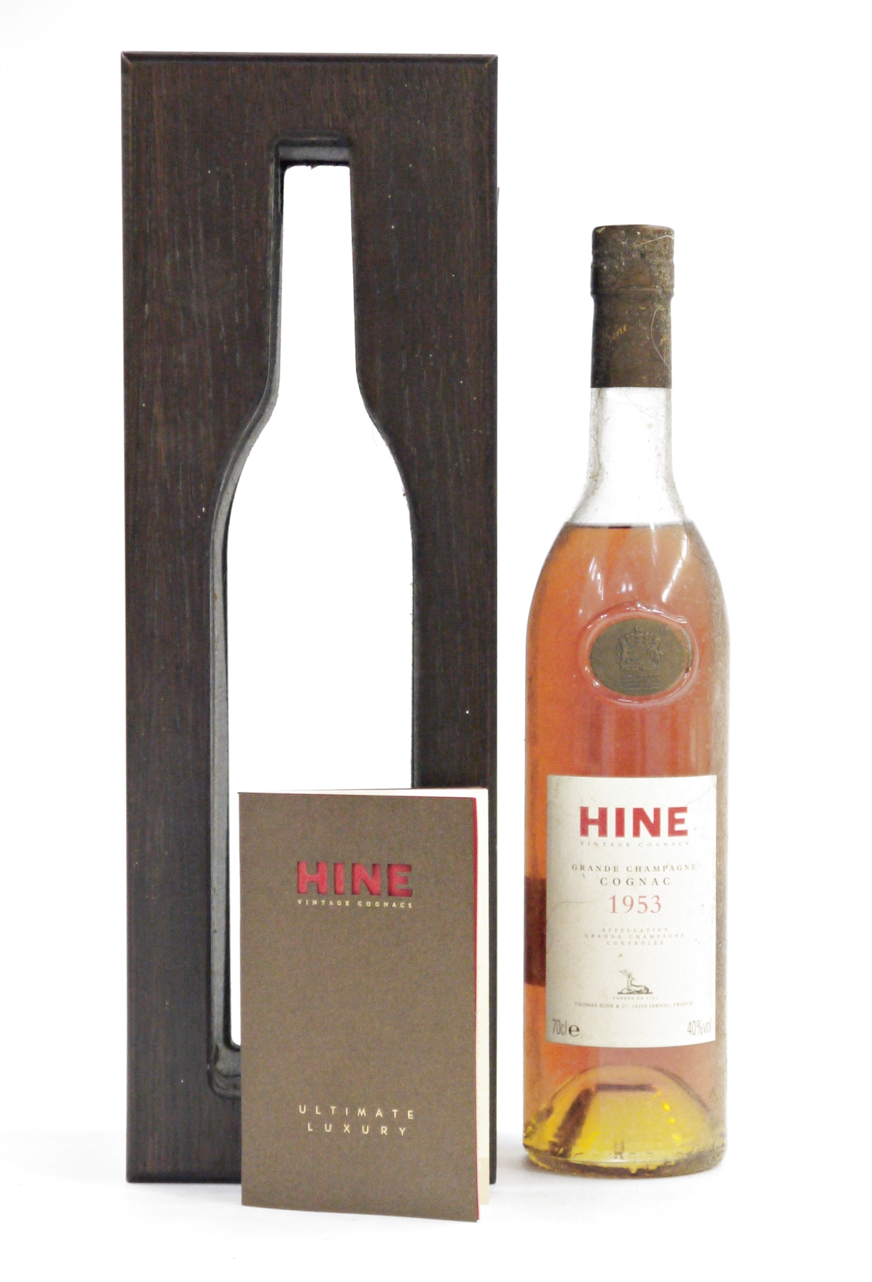 Bottle of Hine 1953 Grand Champagne Cognac, label carries a Royal Warrant by Appointment of Her