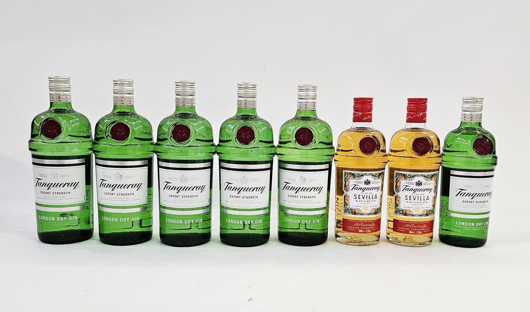 Five bottles of Tanqueray export strength London dry gin, 1L bottles and one 70cl all 43.1% vol,