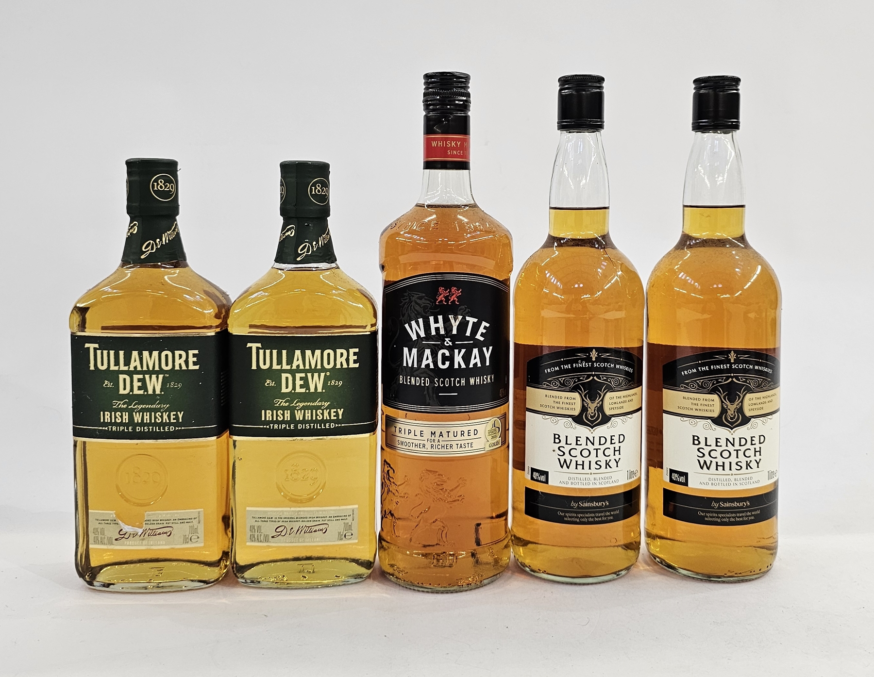 Whyte & Mackay blended scotch whisky 1L 40% vol, together with two bottles of Tullamore Dew the