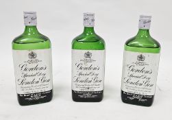 Three vintage bottles of Gordon's Special Dry London Gin, c.1970's/early 80's, 'The heart of a