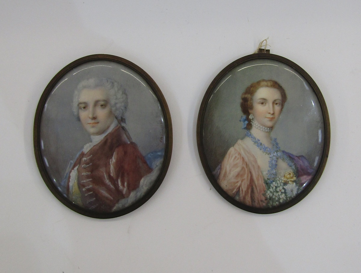 Pair of portrait miniatures depicting a lady and gentleman in the 18th century-style, he in a red