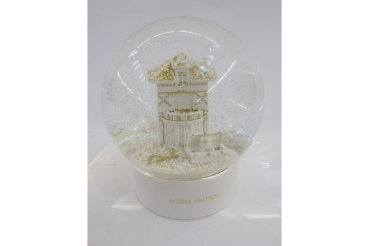 Louis Vuitton snowglobe in original box, the centre with a white and gilt model of the facade of the - Image 2 of 12