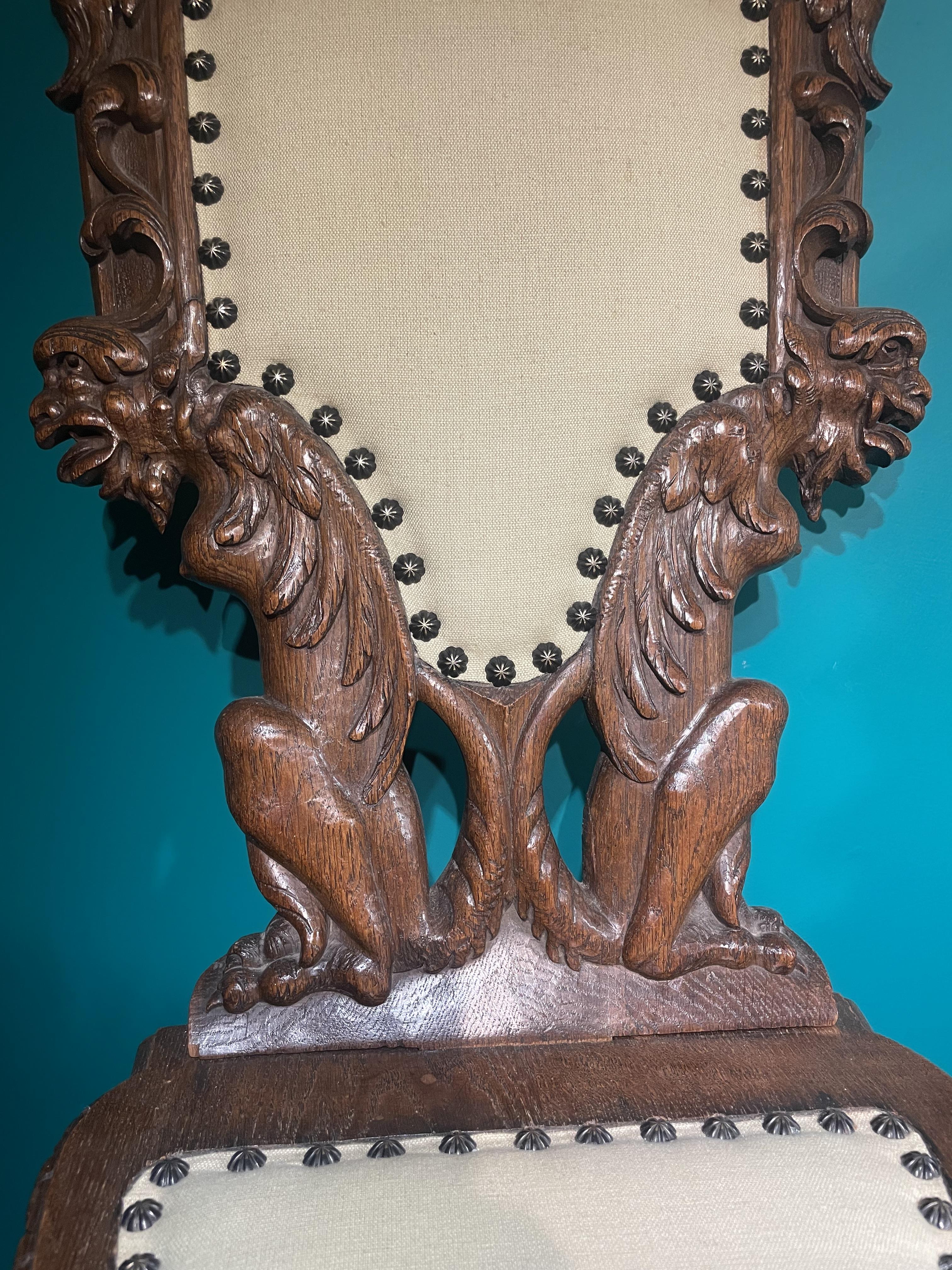 A Pair Of Continental Sgabello Chairs, Heavily Carved With Grotesques And Cherubs. - Image 7 of 7