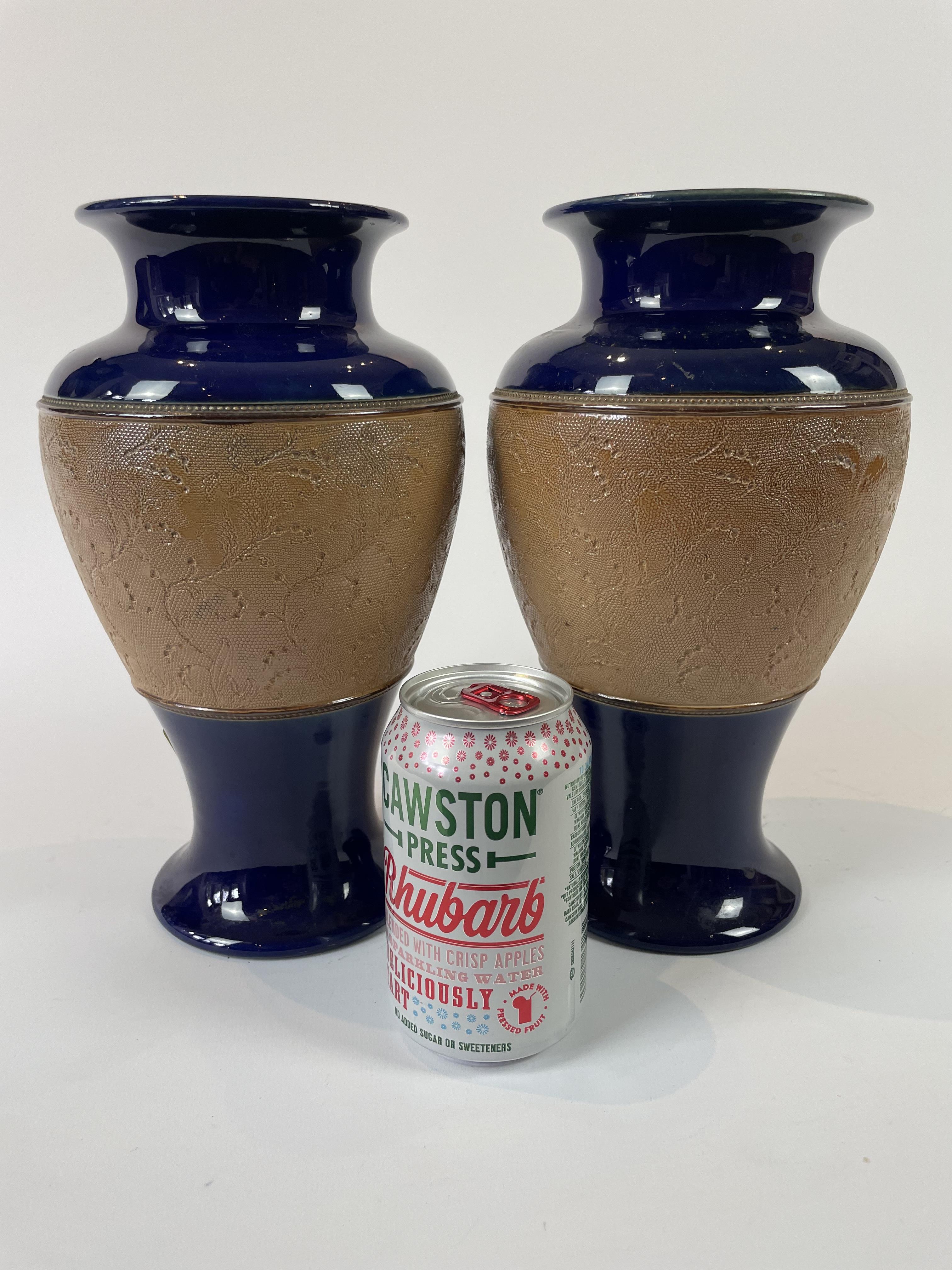 A Pair Of Royal Doulton Vases