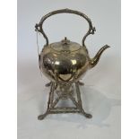 A Silver Plated Spirit Kettle With Naturalistic Stand
