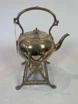 A Silver Plated Spirit Kettle With Naturalistic Stand