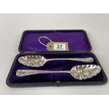 pair of solid silver berry spoons dated 1779