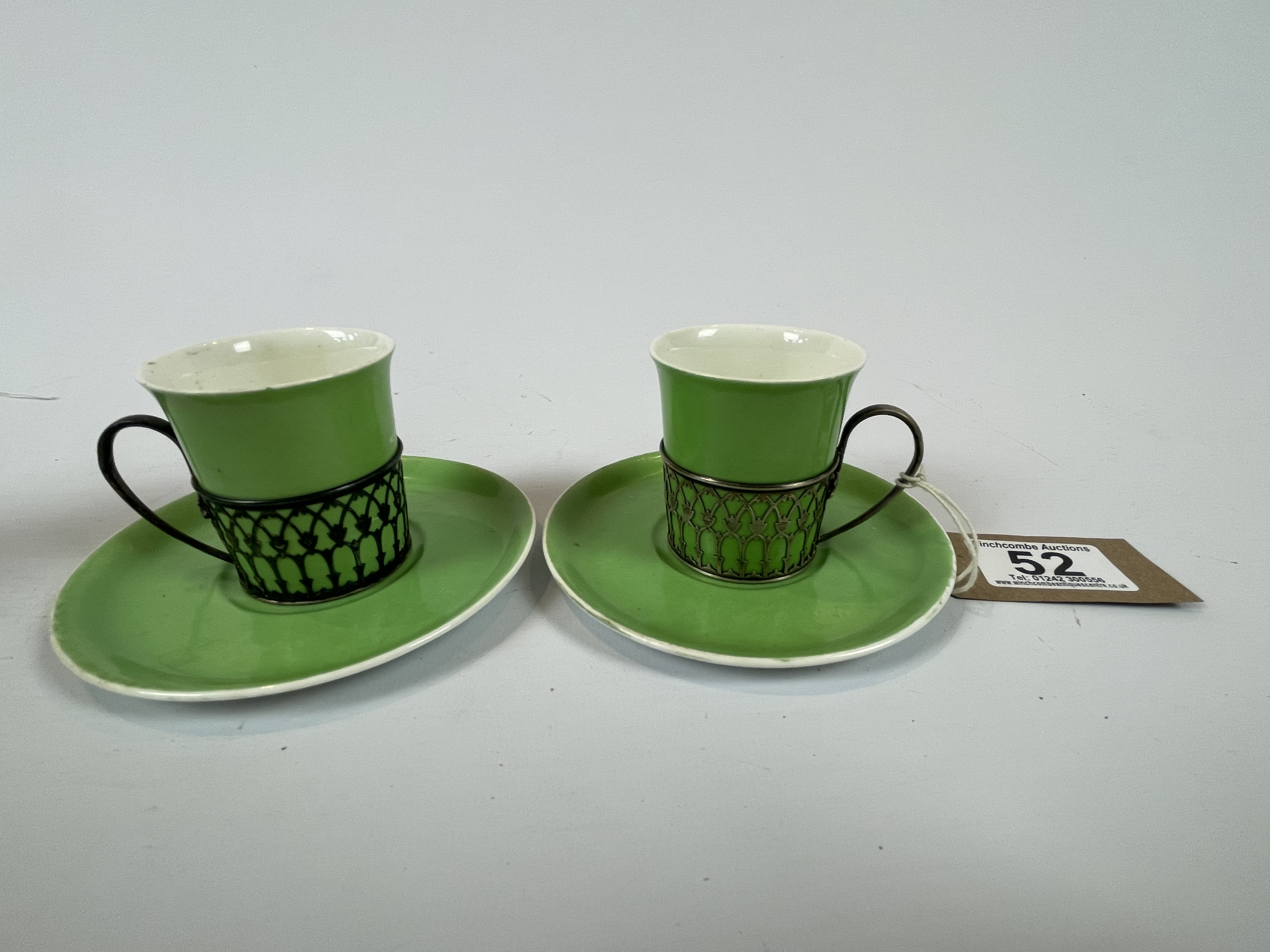 A Pair Of Shelley China Cups and Saucers with Silver Surround and Handle