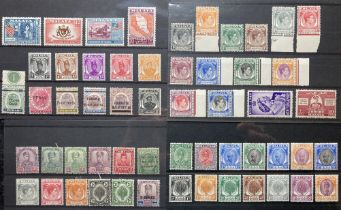 Stamps of Malaya: Four stock cards of mint issues of Straits Settlements and Malay states such as Ke