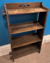 A four tier oak bookcase with peg joints to the side