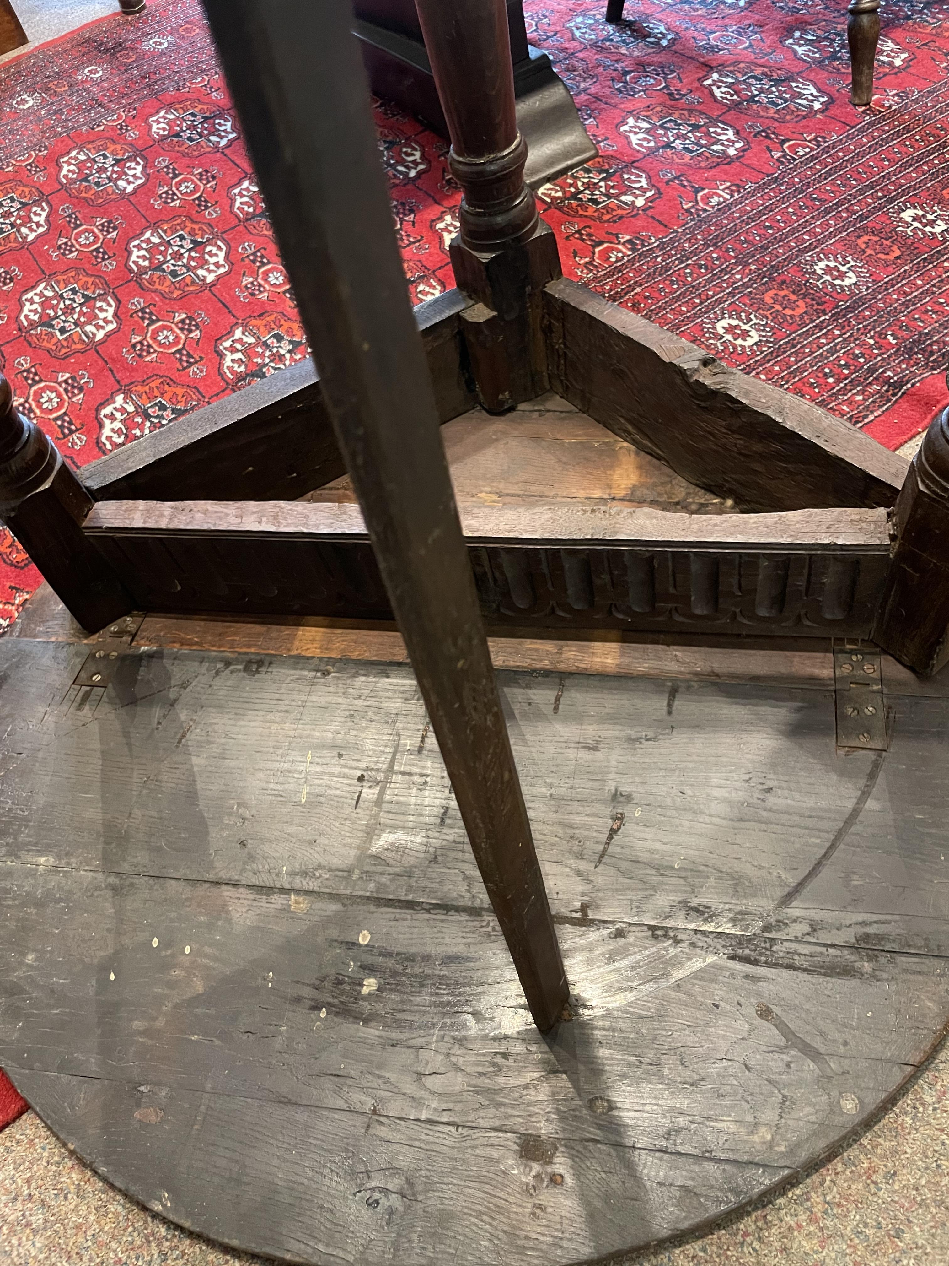 A 17th century oak credence table with a drop leaf side. - Image 5 of 8