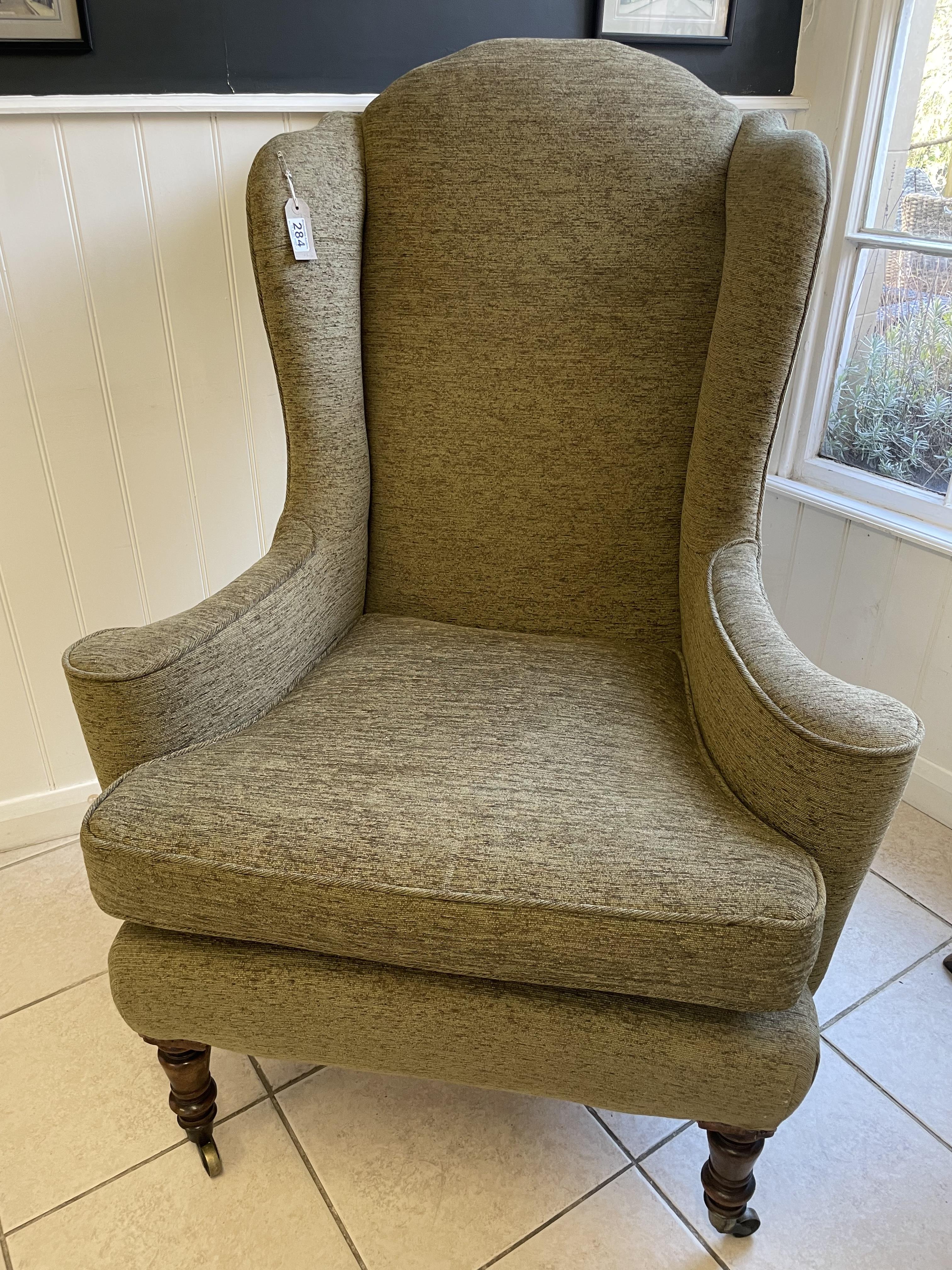 A Period Wing Back Chair In A Queen Ann Style