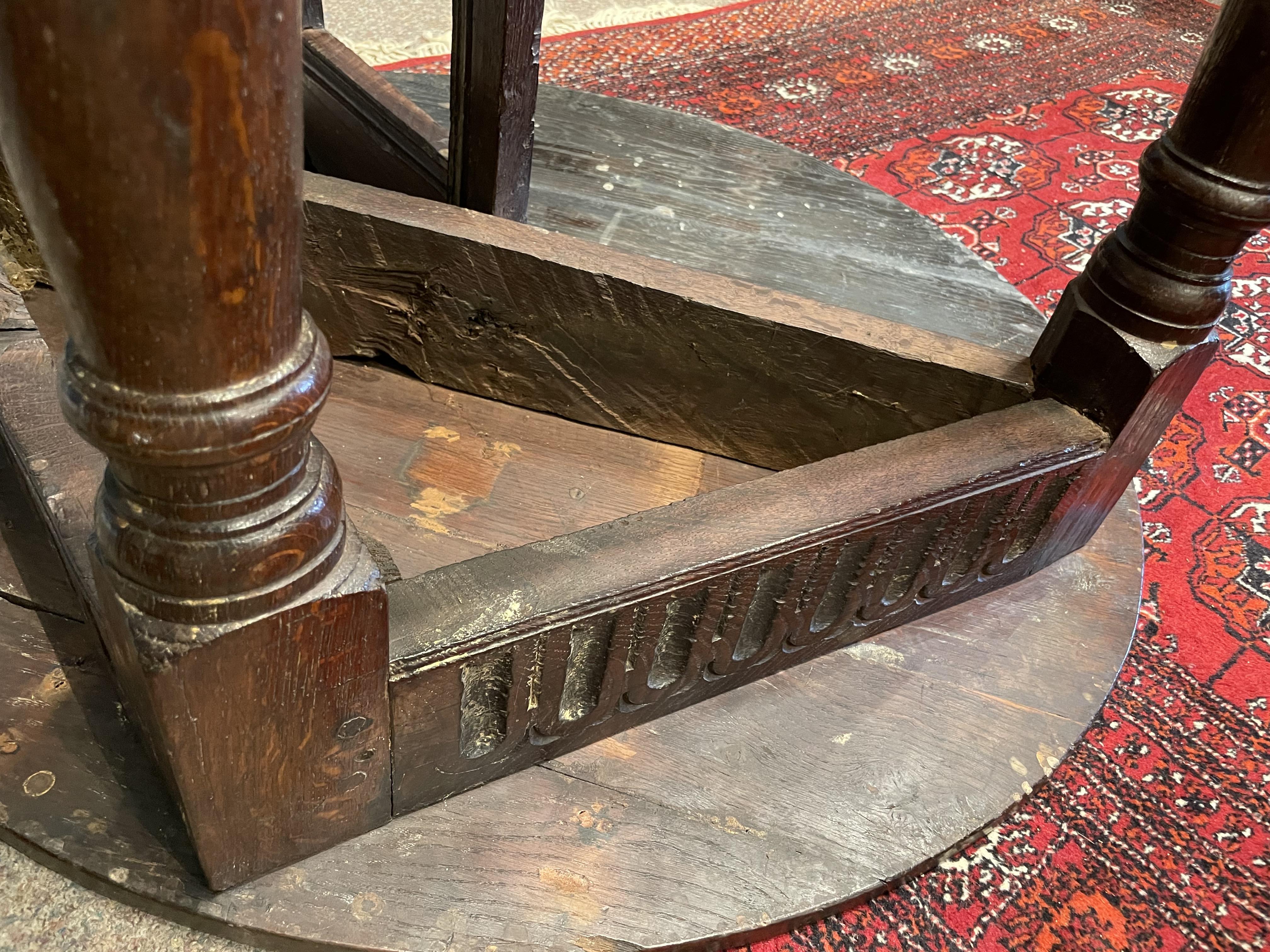 A 17th century oak credence table with a drop leaf side. - Image 6 of 8