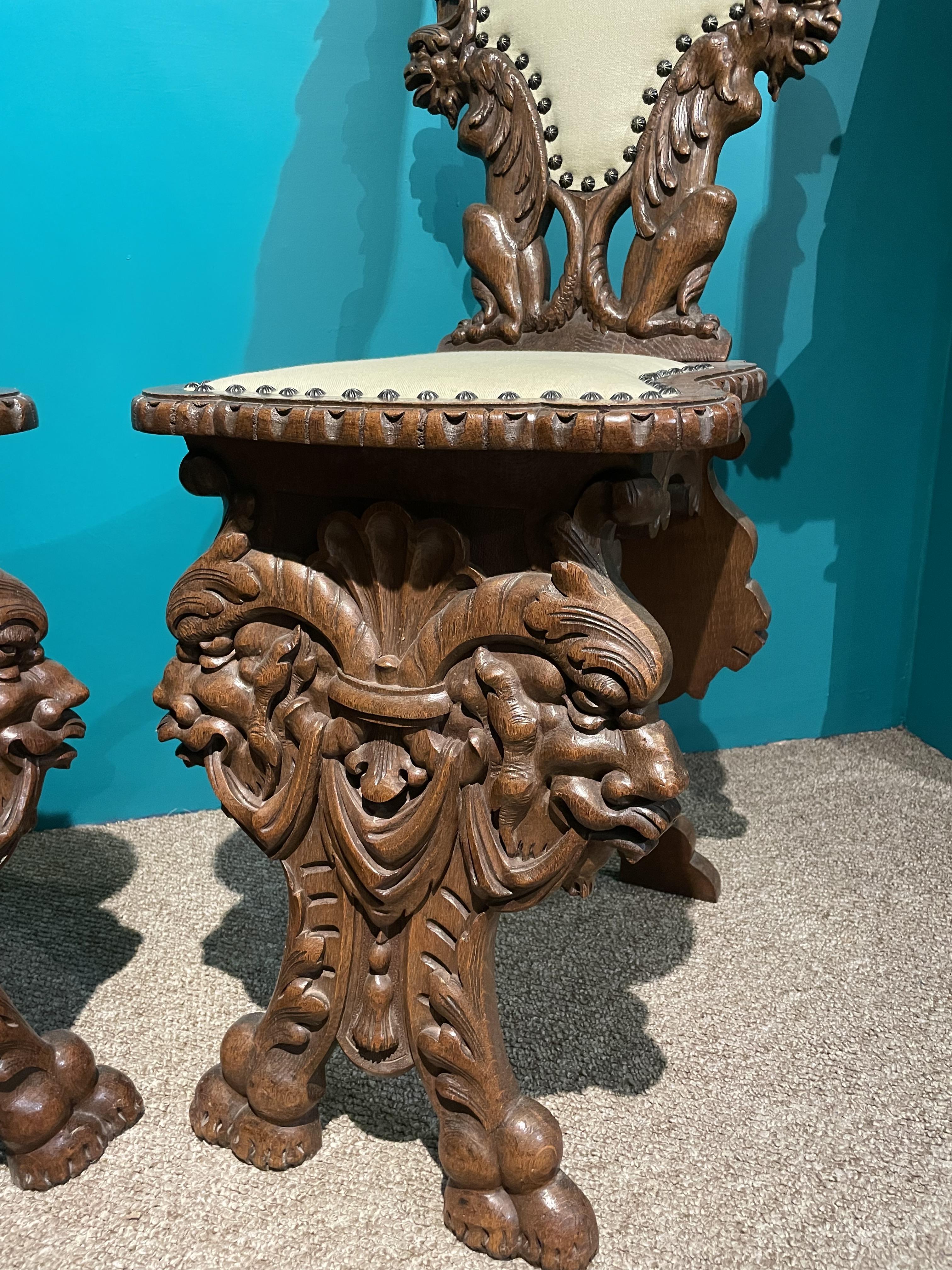 A Pair Of Continental Sgabello Chairs, Heavily Carved With Grotesques And Cherubs. - Image 2 of 7