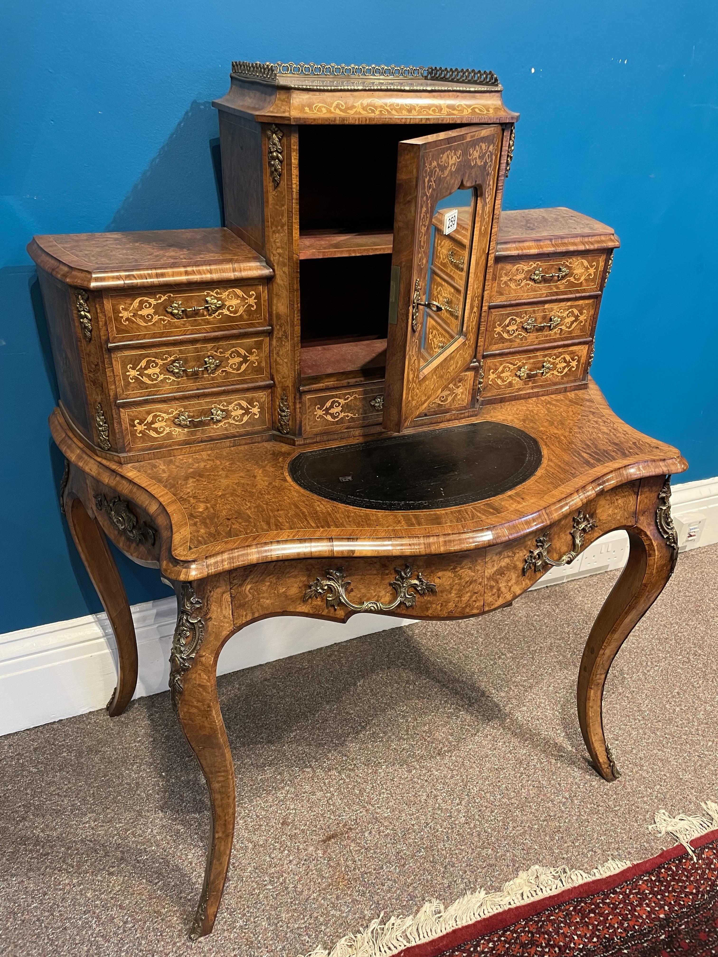 A 19th century French Walnut 'Bon-De-Jour' desk with extensive marquetry, leather insert. - Image 2 of 2