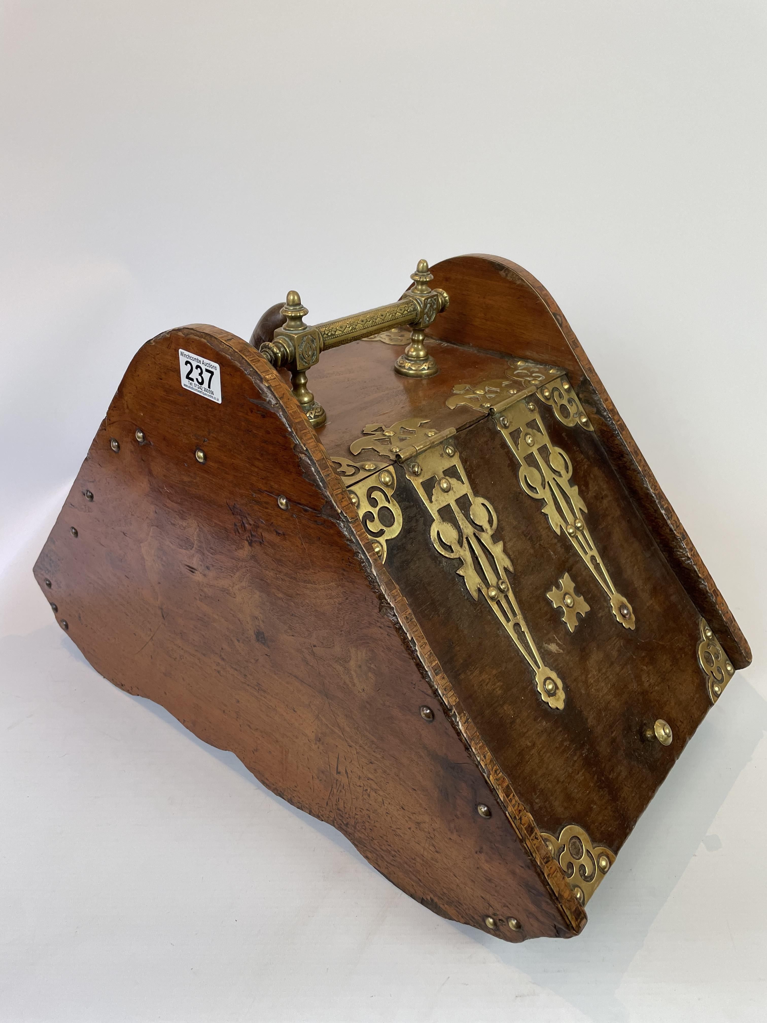 A Victorian brass mounted coal scuttle and shovel with inlay