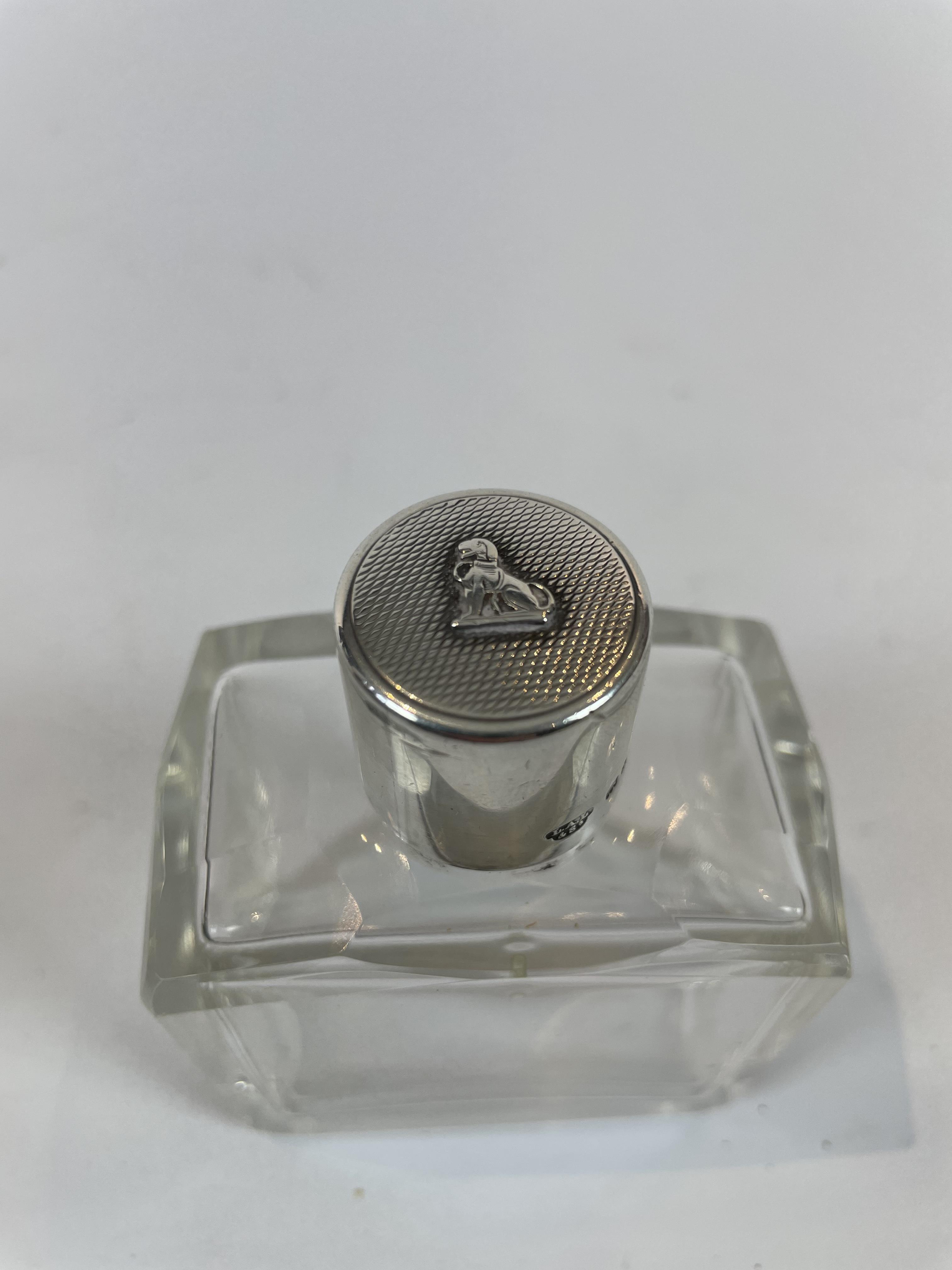 Silver topped scent bottle with dog embossed on the top dated 1930 - Image 2 of 2
