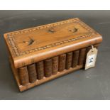 Treen box with inlaid swallows and hidden compartment beneath.