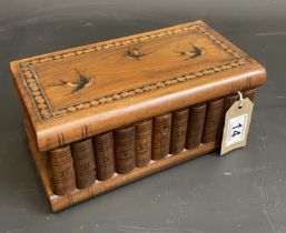 Treen box with inlaid swallows and hidden compartment beneath.