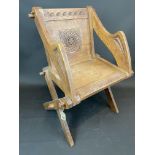 A Carved Oak Glastonbury Chair