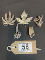 A Collection Of Five Brooches including some silver