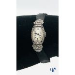 Jewellery: Art deco ladies watch in Platinum set with sapphire and diamonds. (working condition)