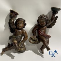Wooden sculptures: A pair of wood-carved and polychrome 18th century angels.
