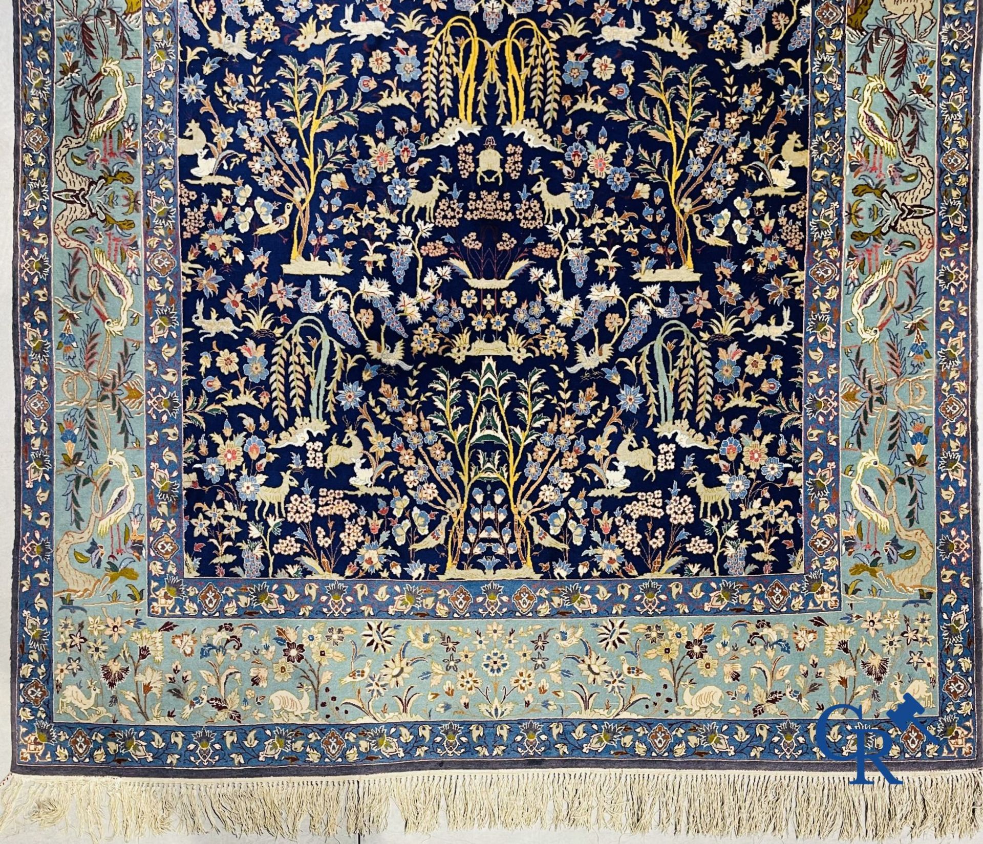 Oriental carpets: Iran. Isfahan, Persian hand-knotted carpet with a decor of animals, birds, plants  - Image 9 of 11