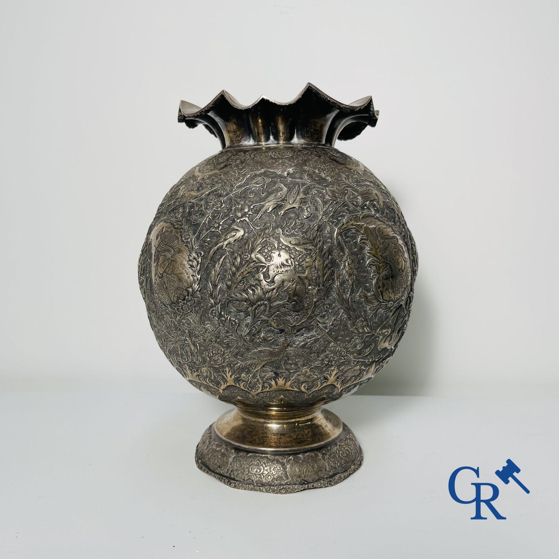Silver: Vase in silver (Iran?) with a fine decor of birds, forest animals and characters.