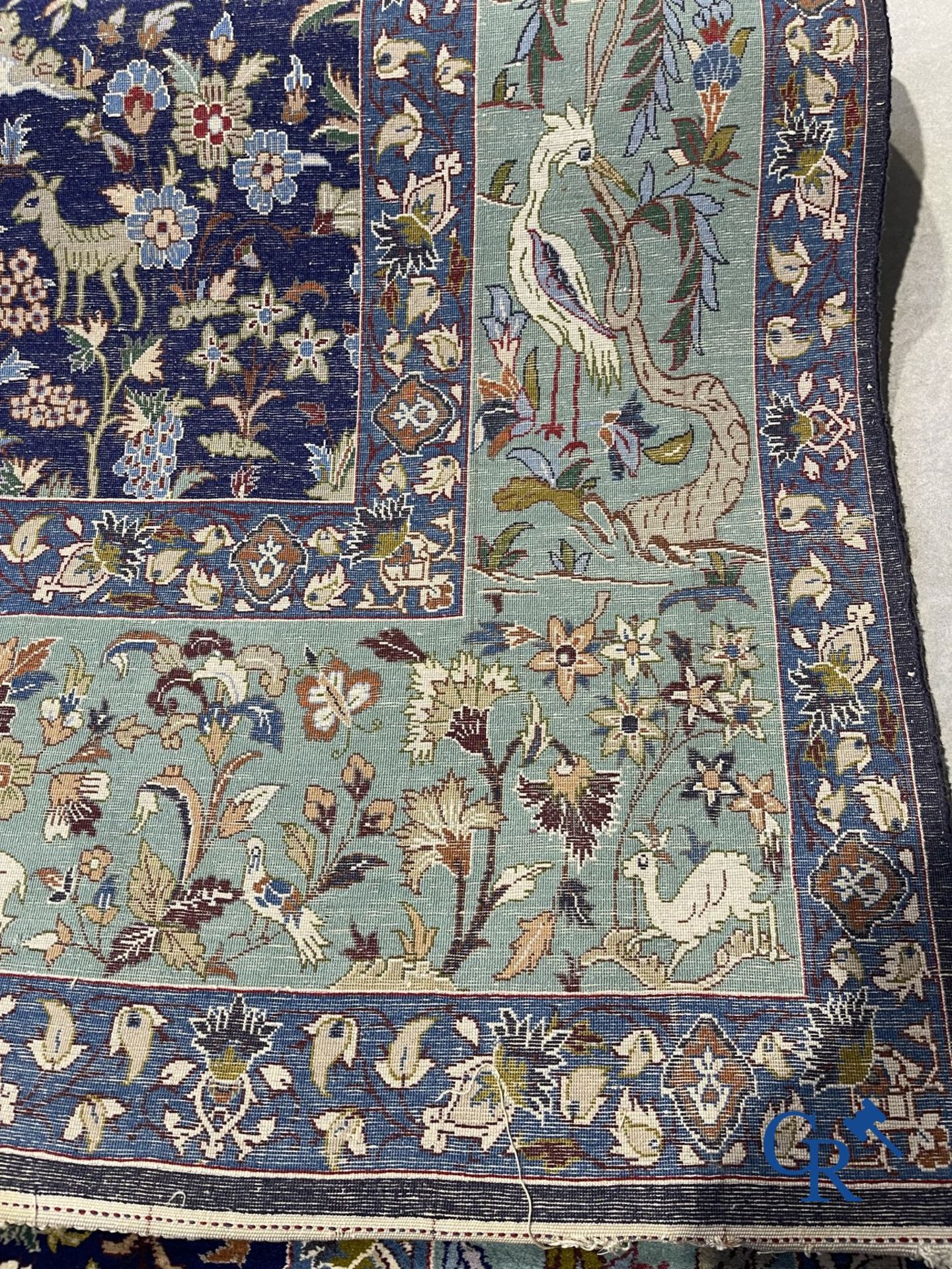 Oriental carpets: Iran. Isfahan, Persian hand-knotted carpet with a decor of animals, birds, plants  - Image 11 of 11