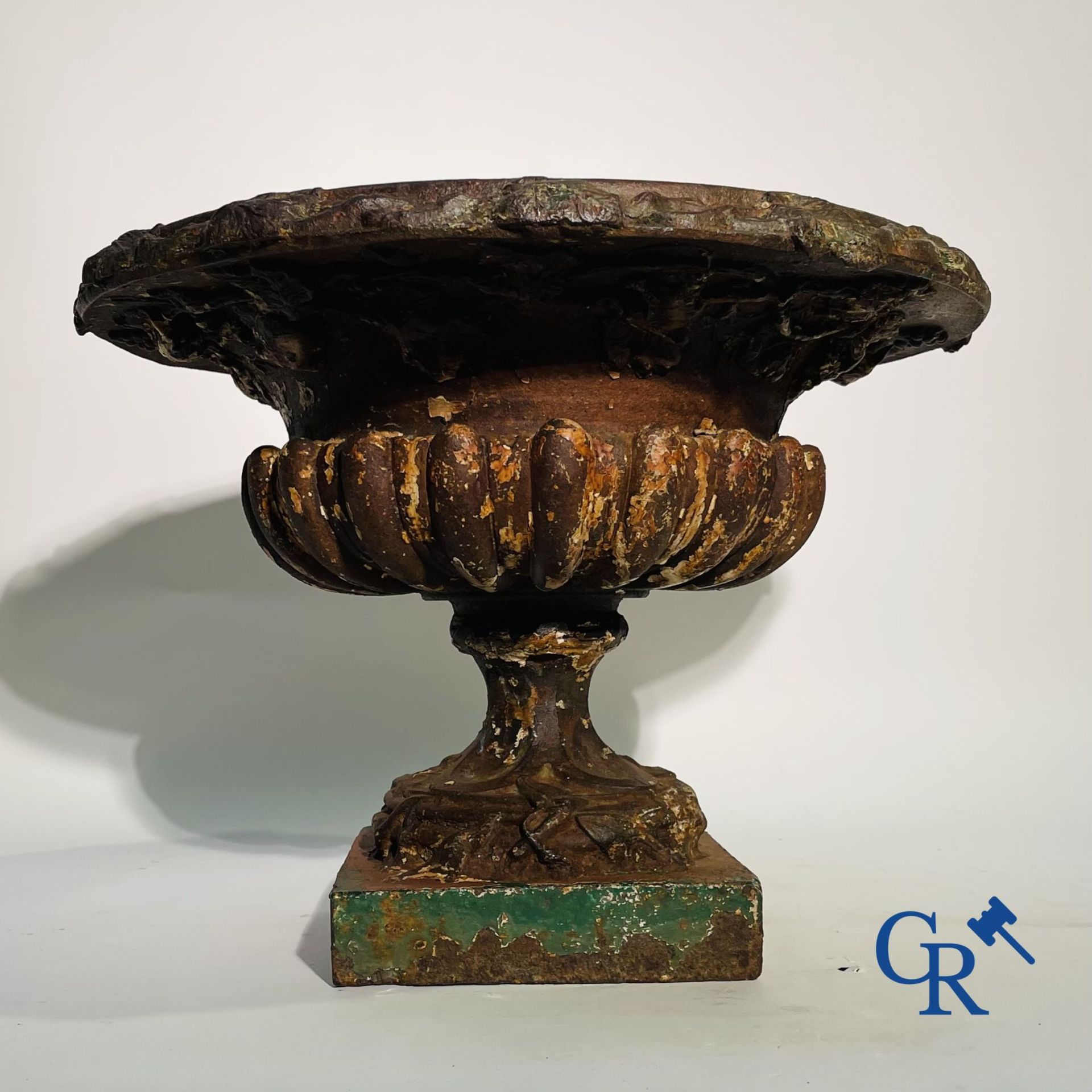 A 19th century cast iron garden vase decorated with grapevines. - Image 2 of 7
