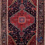 Oriental carpets: Oriental hand-knotted wool carpet.