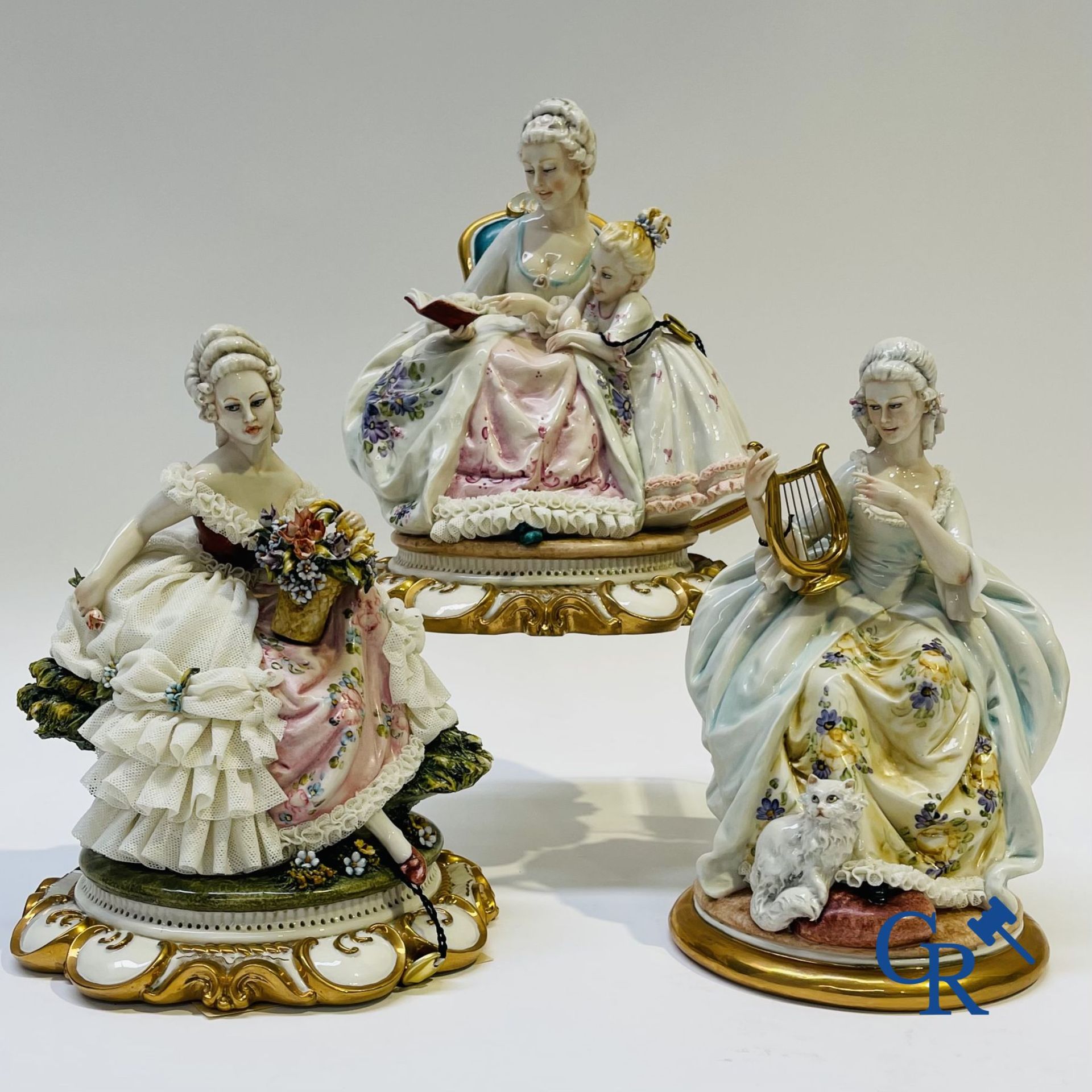Porcelain: Capodimonte: 3 groups in Italian porcelain with lace.