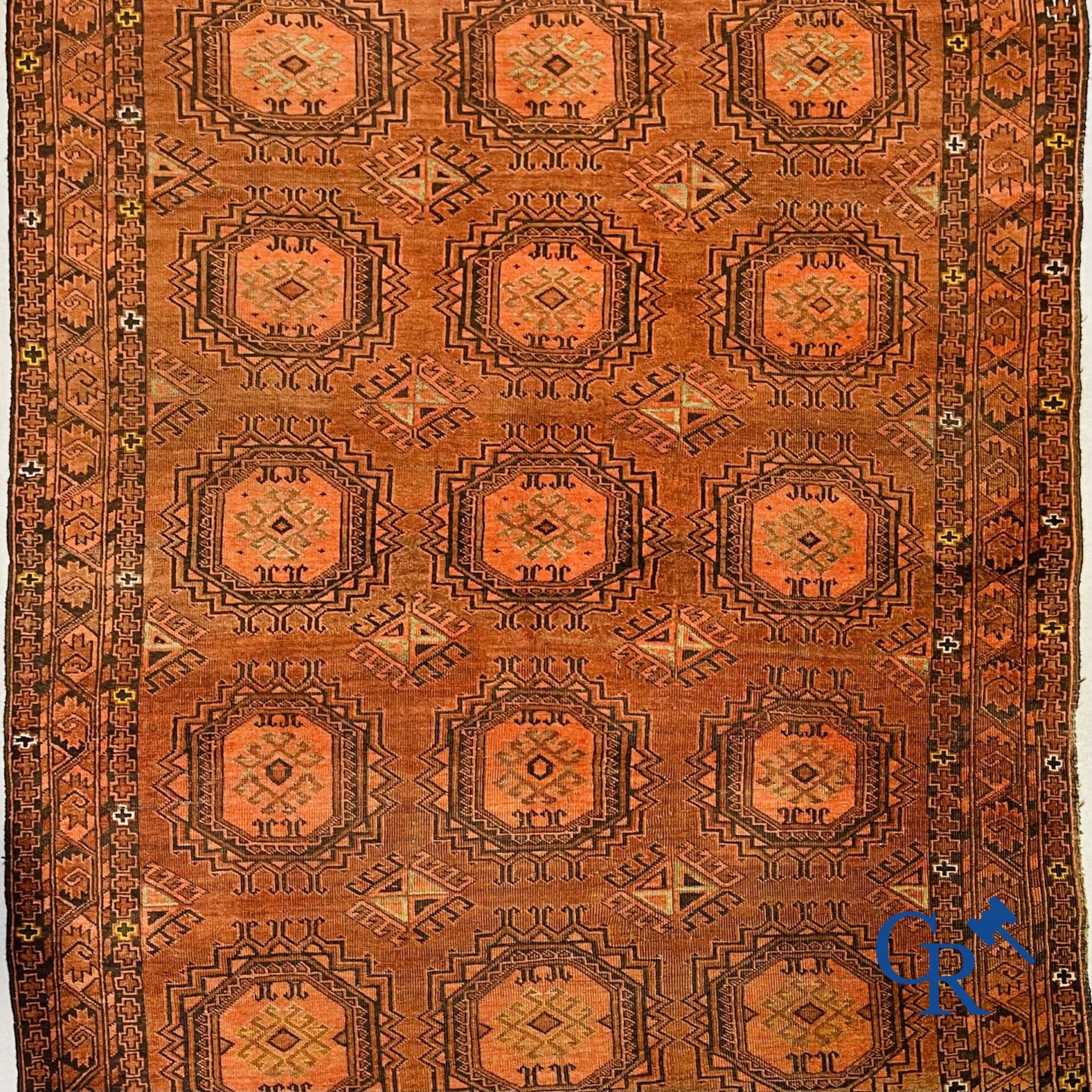 Oriental carpets: Large antique oriental carpet.