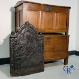 2 oak chests and an antique cast iron fireplace plate.