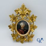 Miniature portrait in a gilded wood-carved frame. 19th century.