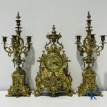 A three-part bronze fireplace clockset in Renaissance style and 2 painted tin and bronze pendant clo
