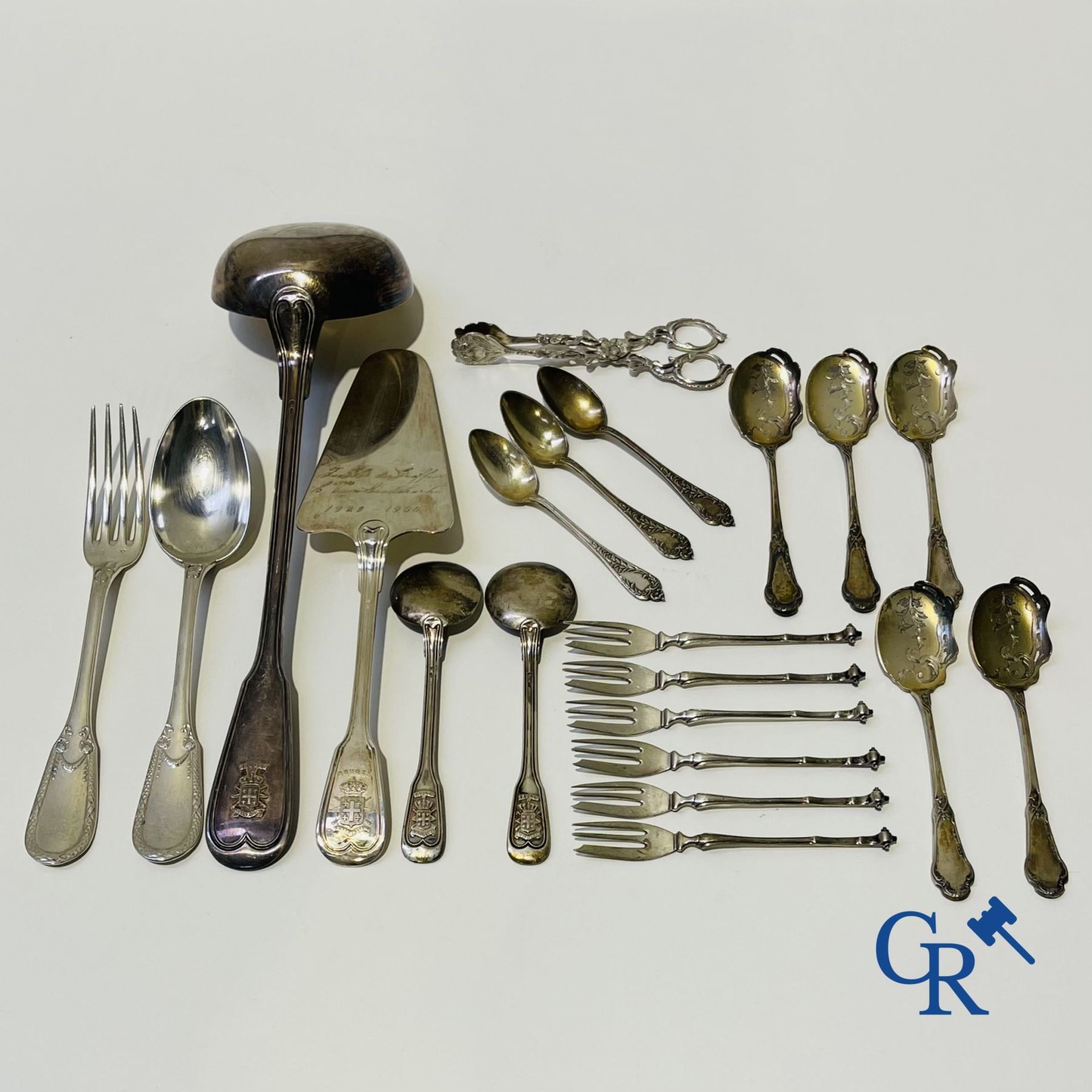 Silver: A lot of silver cutlery, a cake scoop and others including Delheid.