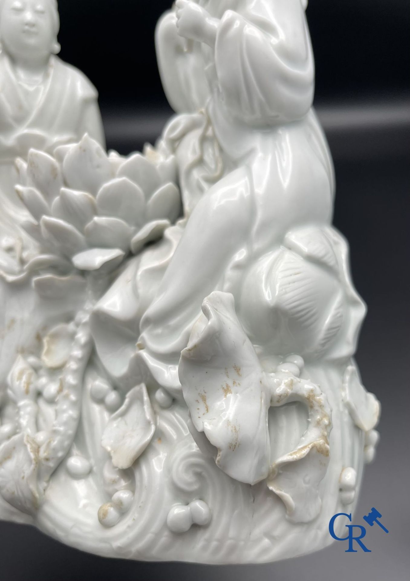 Chinese porcelain: A Buddhist lion and a group in blanc de Chine. - Image 16 of 28