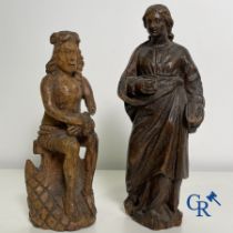 2 religious wood sculptures. Christ on the cold stone and a statue of an apostle. 18th century.
