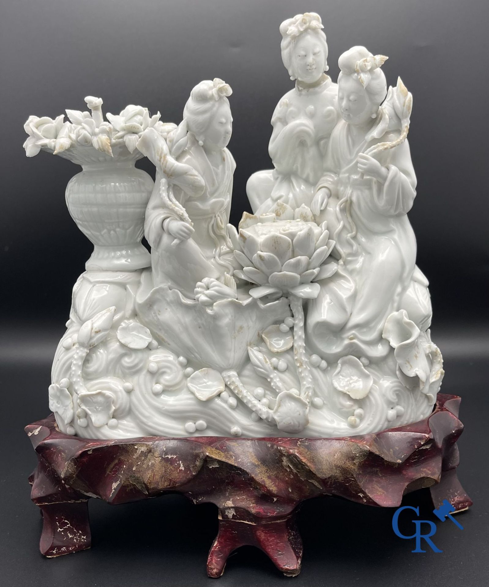 Chinese porcelain: A Buddhist lion and a group in blanc de Chine. - Image 2 of 28