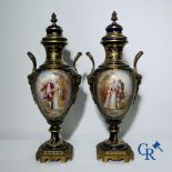 Porcelain: Sèvres: Pair of bronze mounted vases in Sèvres porcelain..
