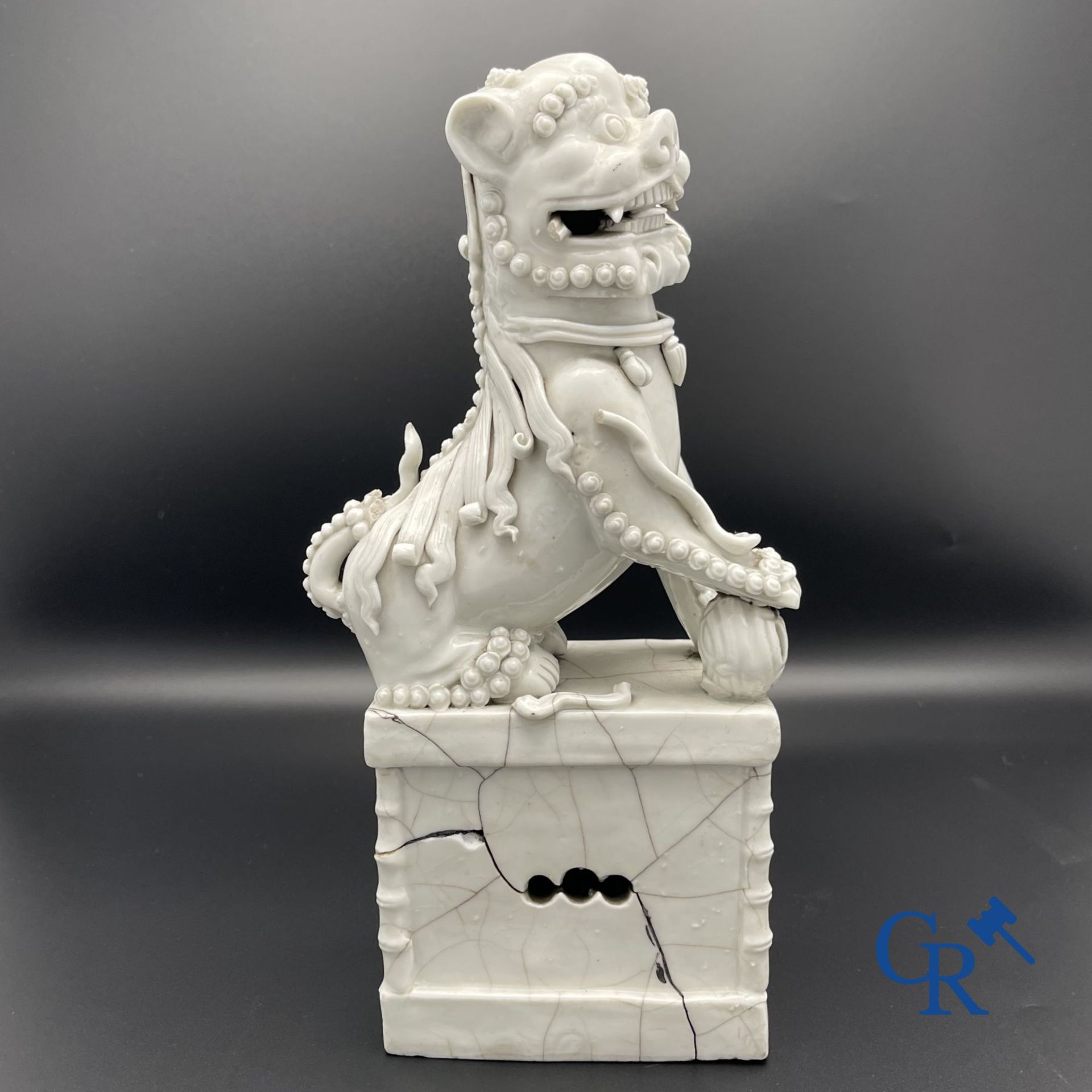 Chinese porcelain: A Buddhist lion and a group in blanc de Chine. - Image 3 of 28