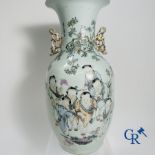 Chinese porcelain: Chinese vase with a decor of 7 children playing in a garden.