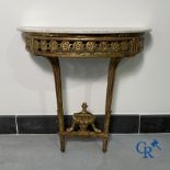 Furniture: Wood sculpted and gilded crescent shaped console. LXVI-period.